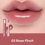 Close-up of soft, glossy lips wearing Romand Glasting Color Gloss in Rose Finch, showcasing the shiny finish when applied.