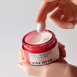 some by mi snail truecica miracle repair cream texture with hands