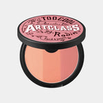Too Cool for School Artclass By Rodin Fard à Joues de Rosée round blush compact with vintage-inspired design, showcasing a gradient of peach and pink shades.