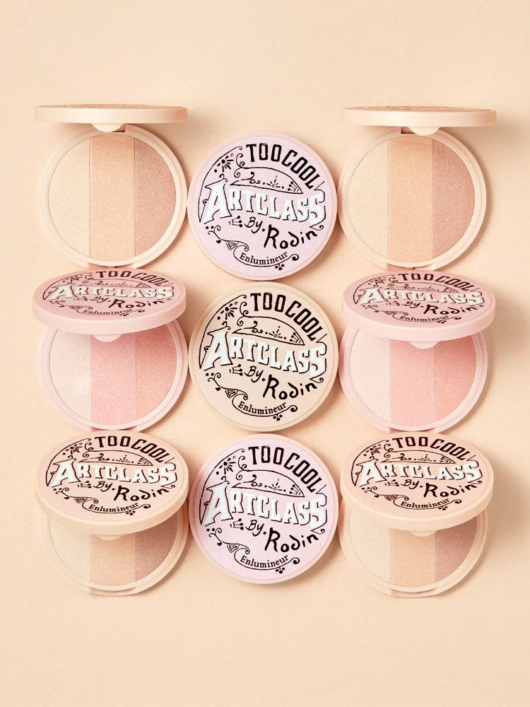 Nine pastel compact powders Too Cool for School Artclass By Rodin Highlighter arranged in a grid, featuring elegant design and varying shades for highlighting and contouring.