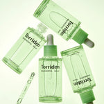 Four bottles of Torriden Balanceful Cica Serum in a refreshing green hue, with droppers and product details prominently displayed.
