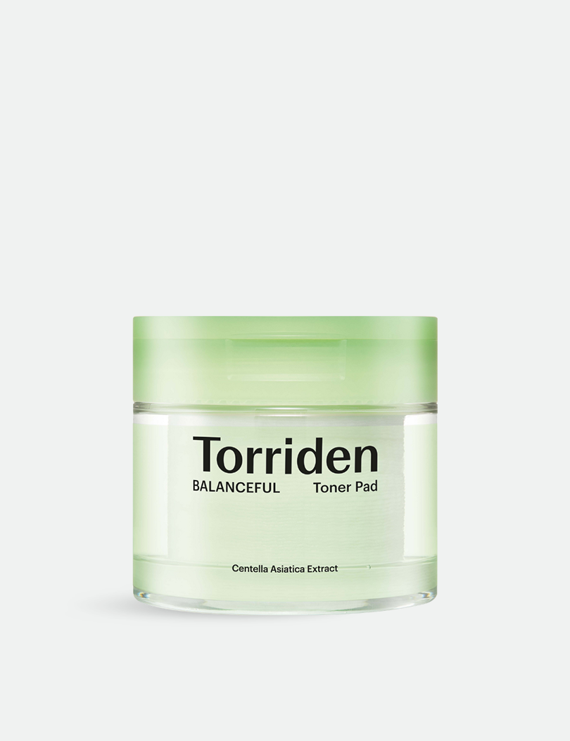 Torriden Balanceful Toner Pad in a clear jar with a green lid, featuring the brand name and a label highlighting 'Centella Asiatica Extract,' set against a neutral background.
